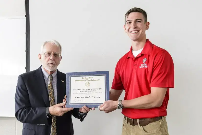 scholarship presenter and student recipient