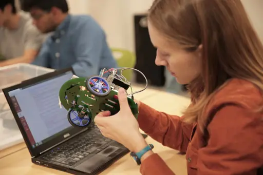 student with robot