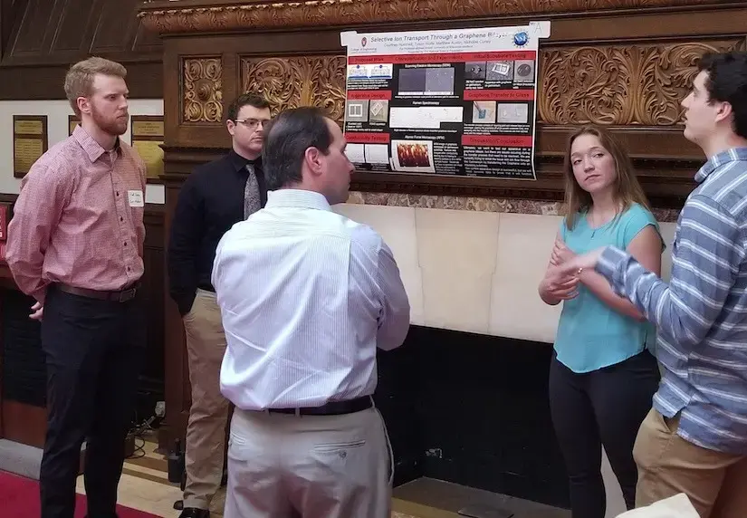 students at ASM Bergmann Seminar poster session