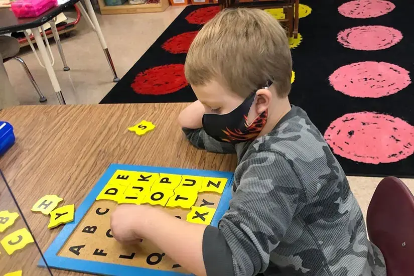 A student working during in-person learning