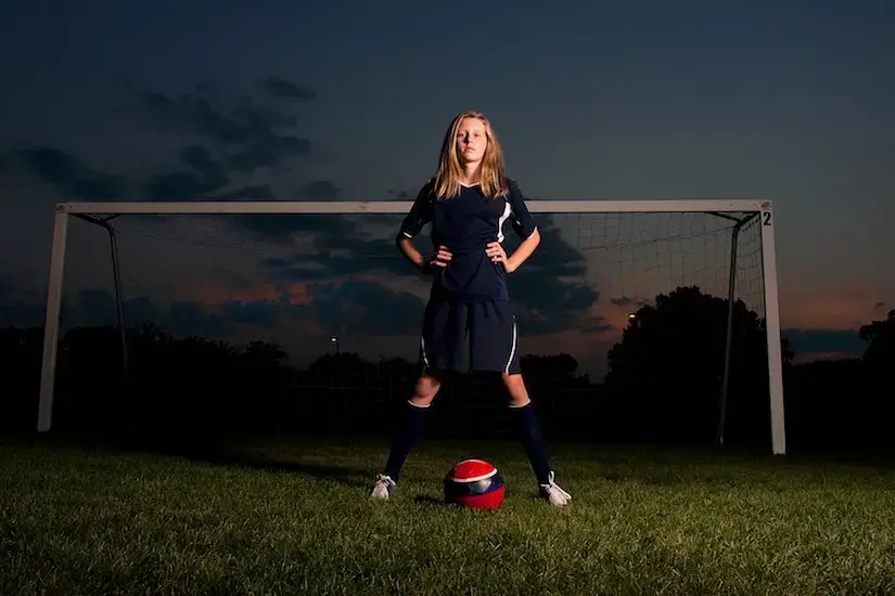 girl in soccer uniform