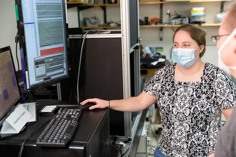 grad students using an automated multiphoton microscope