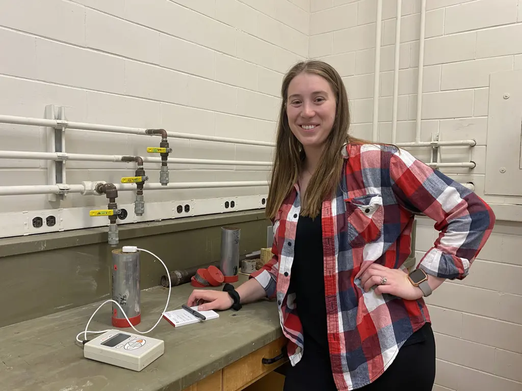 Student doing thermal conductivity testing.