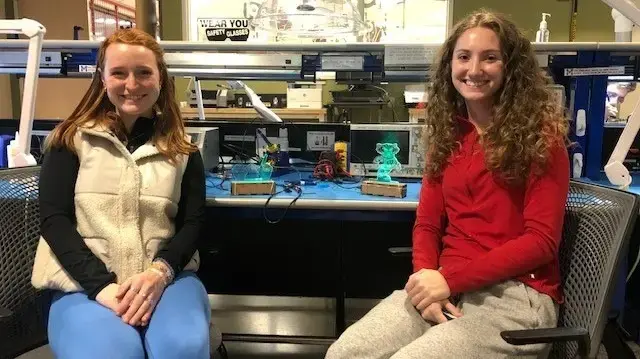 Two college of engineering undergraduate students in the Makerspace working on a project.