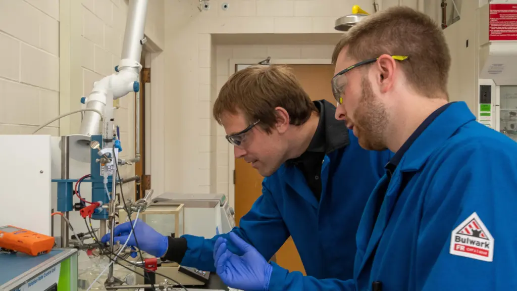 Marcel Schreier working in the lab with student Alex Zielinski