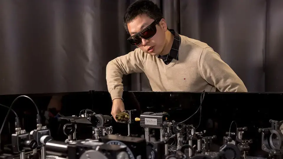 Jun Xiao working in his lab