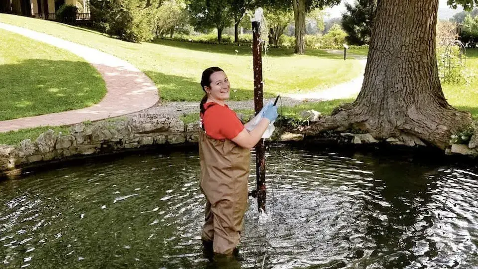 Amy Wiersma taking water samples
