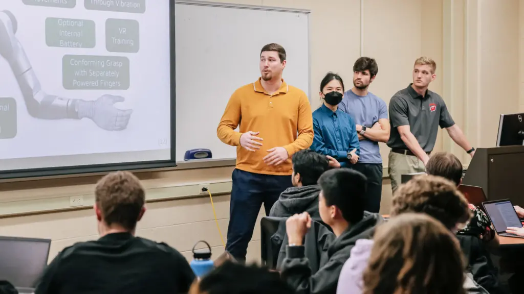 Students Everett Cartier, Xiangfei Wang, Isaac Krause and Ryan Meekin present their research on an advanced arm prosthetic
