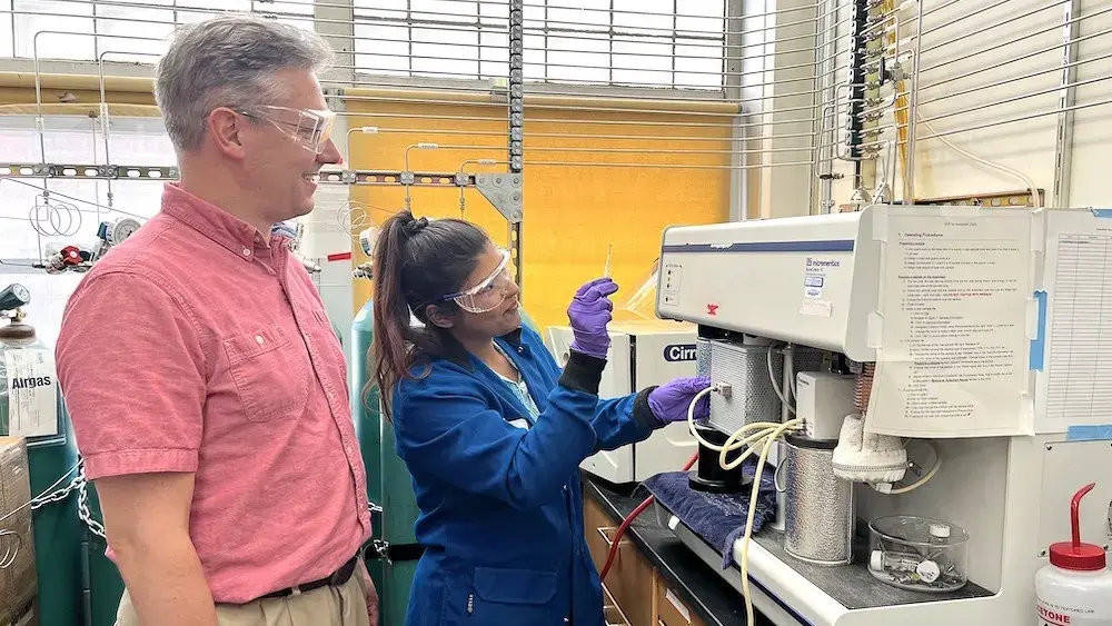 George Huber in the lab with researcher Raka Dastidar