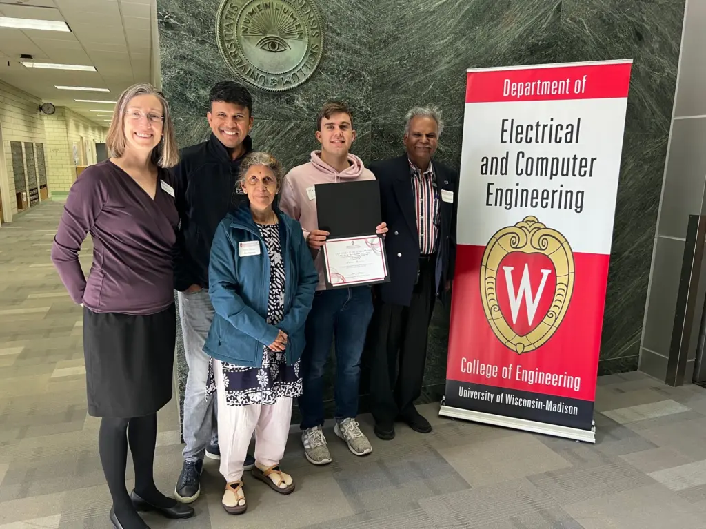 Professor Susan Hagness with alum Nana Murugesan, his parents, and scholarship recipient