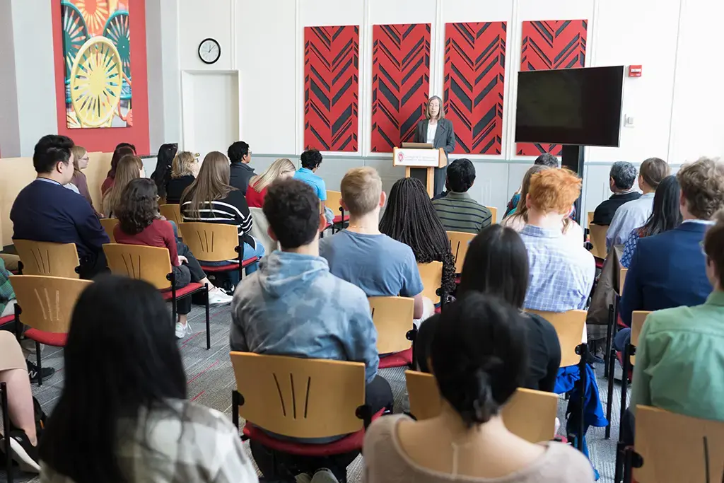 Group of students gather in Engineering Hall for remarks from Department Chair Susan Hagness
