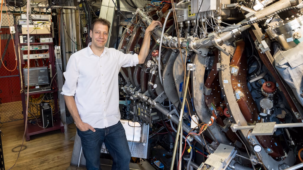 Gentleman standing in front of HSX reactor
