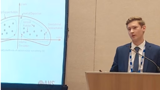Gabe Dengler-Jeanblanc presents his work at the ANS conference.