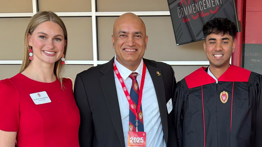 Dean Ranjan and alumni at commencement